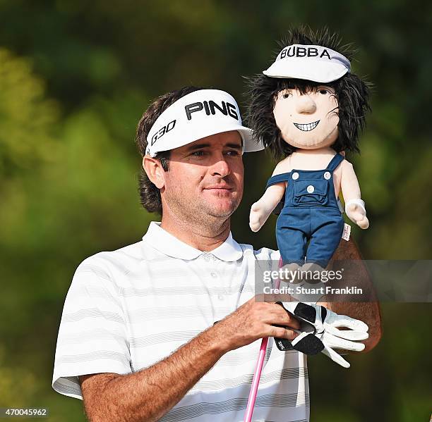 Bubba Watson of USA removes his head cover off of his driver during the second round of the Shenzhen International at Genzon Golf Club on April 17,...