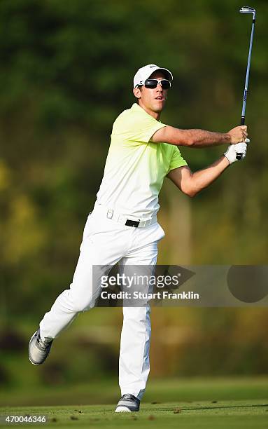 Romain Wattel of France reacts to a shot during the second round of the Shenzhen International at Genzon Golf Club on April 17, 2015 in Shenzhen,...