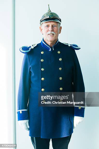 Visitor wearing an old officer uniform from the German Imperator time attends the 17. European Police Congress on February 18, 2014 in Berlin,...
