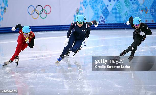 Wenhao Liang of China, Han-Bin Lee of Korea and Eduardo Alvarez of the United States compete in the Short Track Men's 500m Heat at Iceberg Skating...