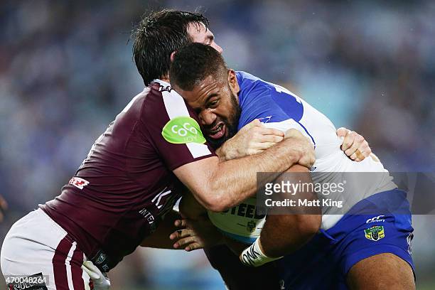 Frank Pritchard of the Bulldogs is tackled by Jamie Lyon of the Sea Eagles during the round seven NRL match between the Canterbury Bulldogs and the...