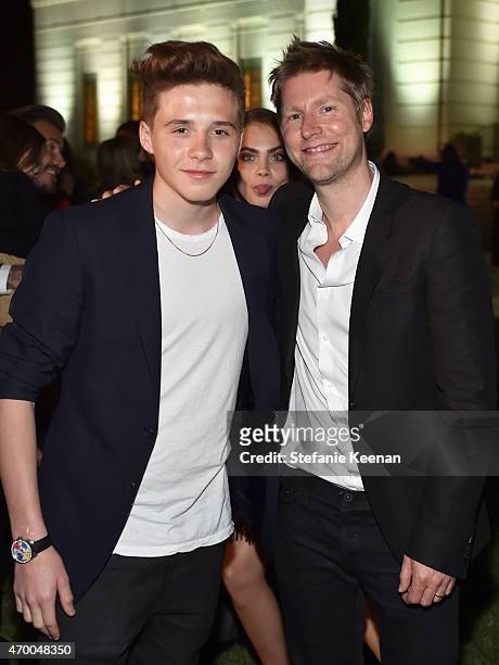 Model Brooklyn Joseph Beckham, model Cara Delevingne and chief executive & chief creative officer of Burberry Christopher Bailey attends the Burberry...