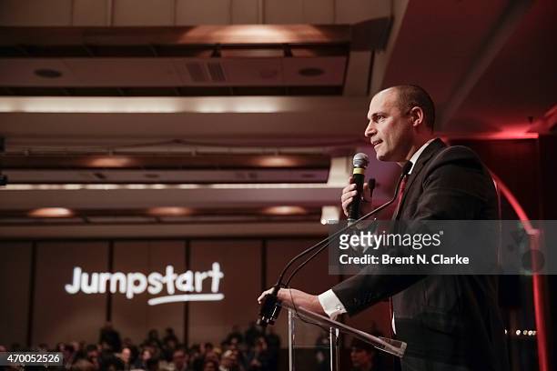 Photographer Nigel Barker conducts a live auction from the stage during the Scribbles To Novels 10th Anniversary Gala held at Pier Sixty at Chelsea...