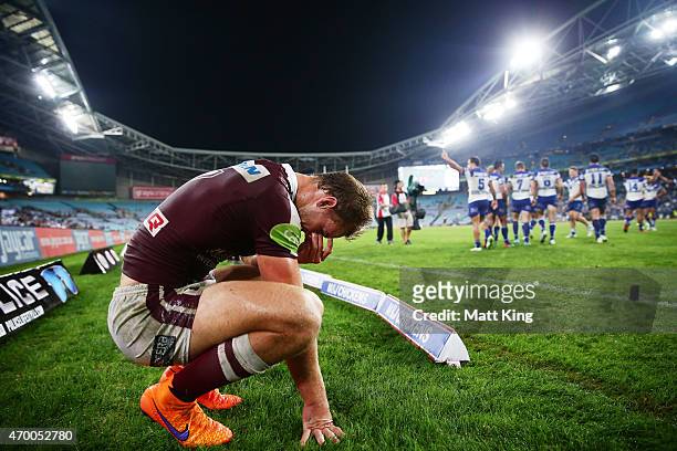 Daly Cherry-Evans of the Sea Eagles looks dejected after the final try to Corey Thompson of the Bulldogs during the round seven NRL match between the...