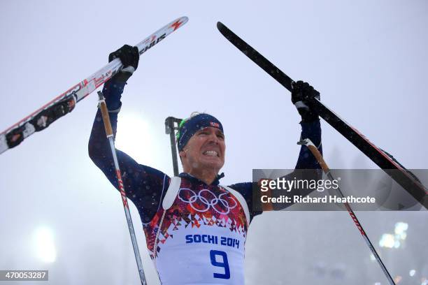 Gold medalist Emil Hegle Svendsen of Norway celebrates after the Men's 15 km Mass Start during day 11 of the Sochi 2014 Winter Olympics at Laura...