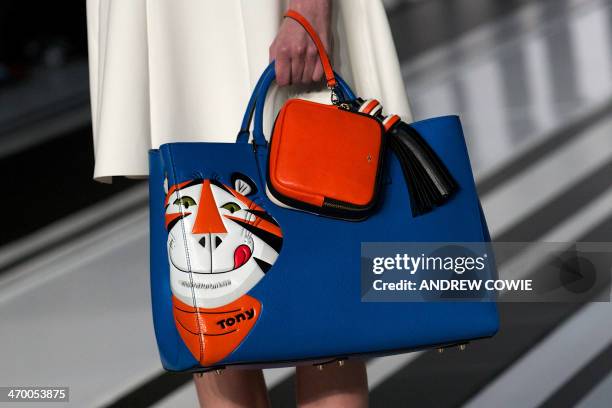 Model presents a creation from designer Anya Hindmarch during the 2014 Autumn / Winter London Fashion Week in London on February 18, 2014. AFP PHOTO...
