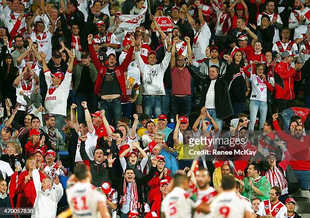 Dragons fans celebrate at the final whistle during the round seven NRL match between the St George Illawarra Dragons and the Brisbane Broncos at WIN...