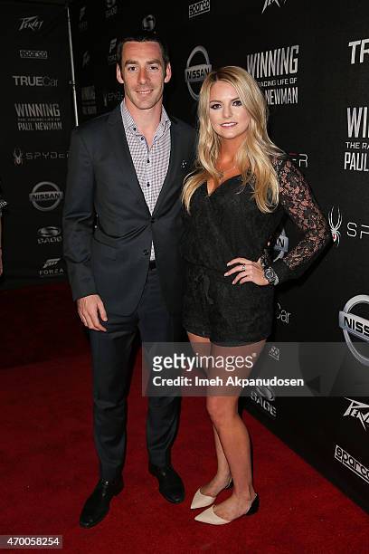 Professional racing driver Simon Pagenaud and Hailey McDermott attend the charity screening of 'WINNING: The Racing Life Of Paul Newman' at the El...