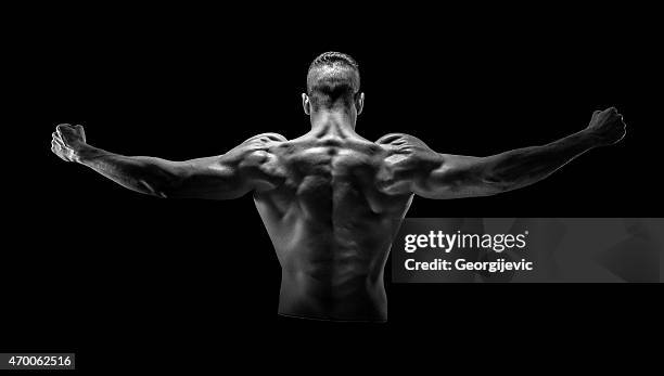 strong man - black and white muscular man stock pictures, royalty-free photos & images