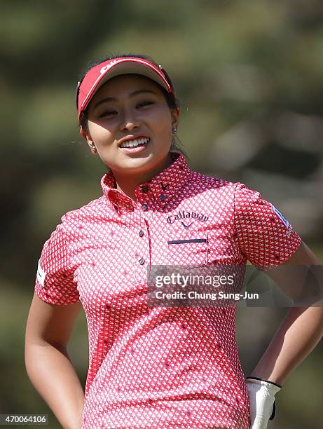Miyuki Takeuchi of Japan recats after a tee shots in the first final round during the KKT Cup Vantelin Ladies Open at the Kumamoto Airport Country...