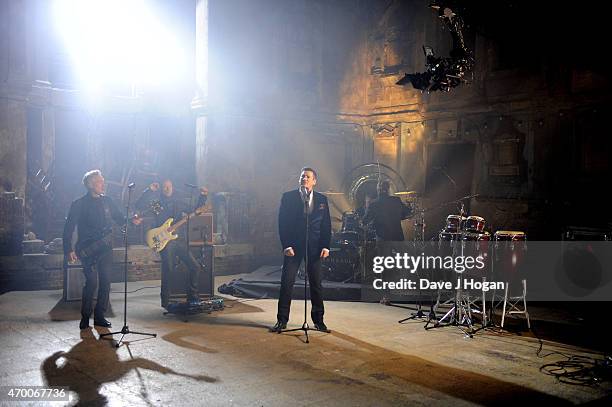 Musicians Martin Kemp, Gary Kemp, Tony Hadley, John Keeble and Steve Norman are seen performing on set of a video shoot for Spandau Ballet's 'Soul...