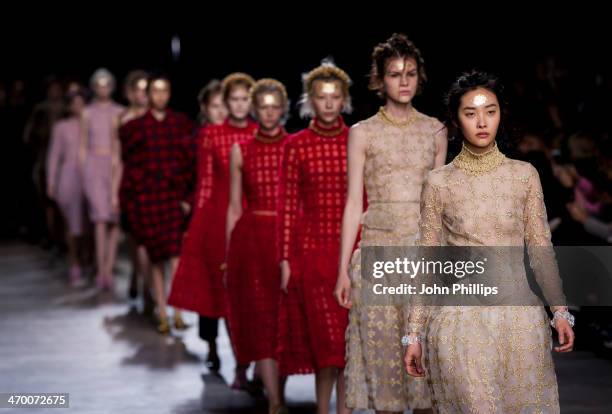 Model walks the runway at the Simone Rocha show at London Fashion Week AW14 at Tate Modern on February 18, 2014 in London, England.