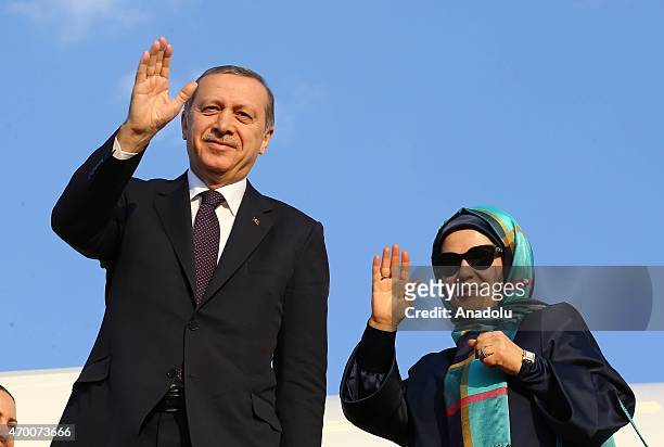 Turkey's President Recep Tayyip Erdogan and his wife Emine Erdogan are seen in front of the Presidential Plane at Shymkent International Airport as...