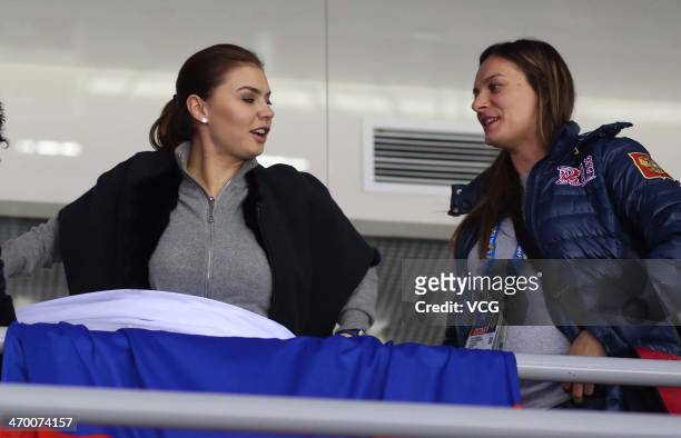 Alina Kabaeva , Russian Olympic champion in rhythmic gymnastics and Yelena Isinbayeva , Russian double Olympic pole vault champion watch the men's...
