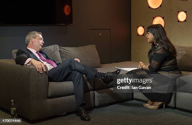 Leader Nigel Farage talks with Bauer City Network presenter Angie Greaves at Bauer Radio on April 17, 2015 in London, England.