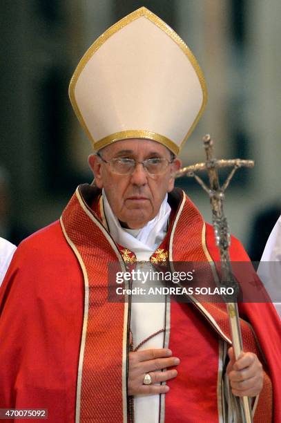 Pope Francis leads the funeral of Cardinal Roberto Tucci at St Peter's basilica on April 17, 2015 in Vatican. AFP PHOTO / ANDREAS SOLARO