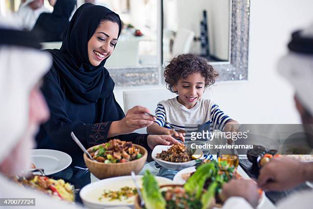 arabic lunch time - islam stock pictures, royalty-free photos & images