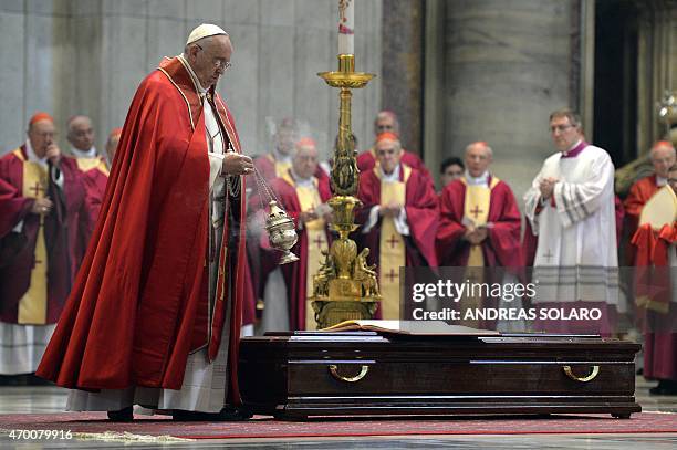 Pope Francis leads the funeral of Cardinal Roberto Tucci at St Peter's basilica on April 17, 2015 in Vatican. AFP PHOTO / ANDREAS SOLARO