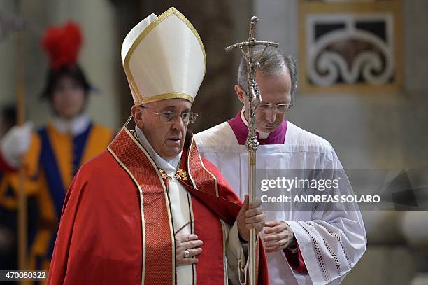 Pope Francis leads the funeral of Cardinal Roberto Tucci at St Peter's basilica on April 17, 2015 in Vatican. AFP PHOTO / ANDREAS SOLARO