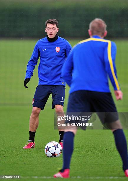 Arsenal's German midfielder Mesut Ozil takes part in a training session at Arsenal's training ground at London Colney, north of London on February 18...