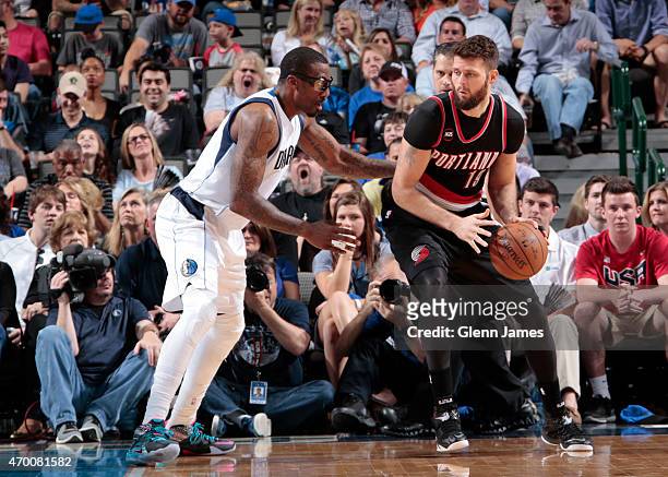 Amar'e Stoudemire of the Dallas Mavericks guards his position against Joel Freeland of the Portland Trail Blazers on April 15, 2015 at the American...