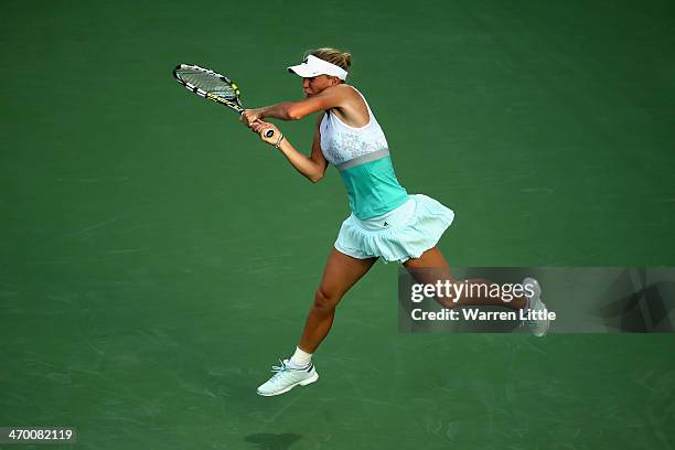 Caroline Wozniacki of Denmark in action against Sabine Lisicki of Germany during day two of the WTA Dubai Duty Free Tennis Championship at the Dubai...