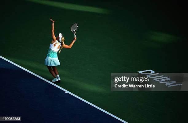 Caroline Wozniacki of Denmark in action against Sabine Lisicki of Germany during day two of the WTA Dubai Duty Free Tennis Championship at the Dubai...