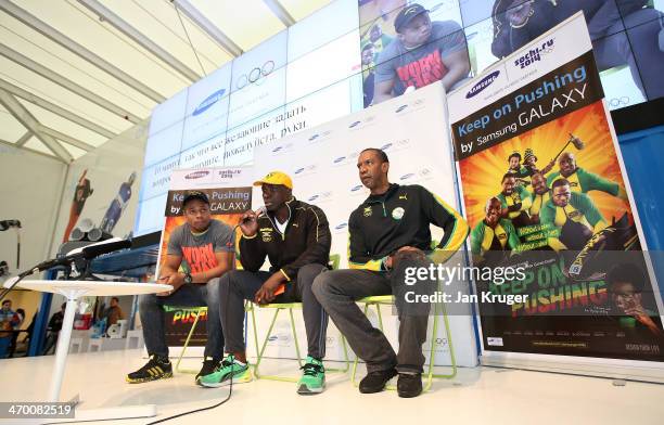 Winston Watts and Marvin Dixon, Jamaica's 2-man bobsleigh team and Jamaican Bobsleigh Federation President Chris Stokes address fans and media at a...