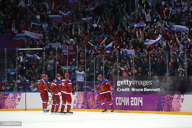 Ilya Kovalchuk of Russia celebrates after with his teammates after scoring a goal in the second period against Lars Haugen of Norway during the Men's...