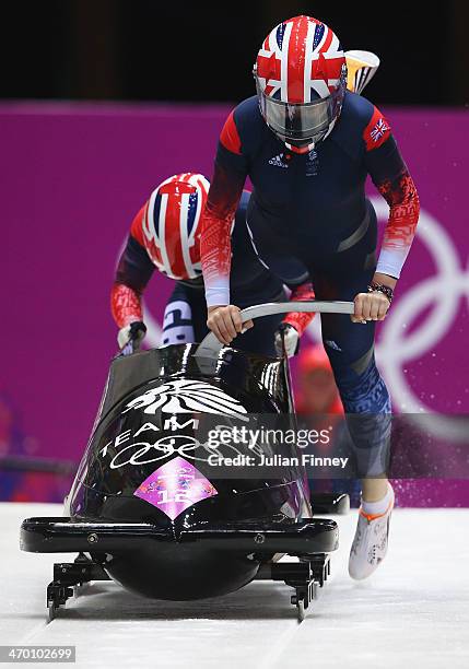 Paula Walker and Rebekah Wilson of Great Britain team 1 make a run during the Women's Bobsleigh heats on day 11 of the Sochi 2014 Winter Olympics at...