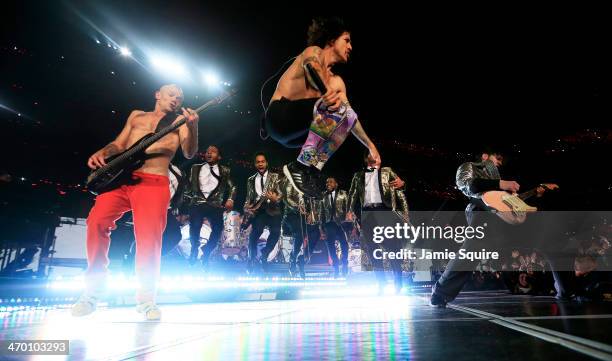 The Red Hot Chili Peppers and Bruno Mars perform during the Pepsi Super Bowl XLVIII Halftime Show at MetLife Stadium on February 2, 2014 in East...