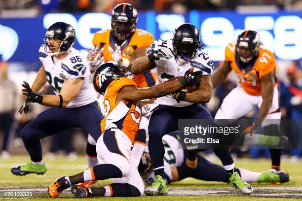Running back Marshawn Lynch of the Seattle Seahawks runs the ball during Super Bowl XLVIII against the Denver Broncos at MetLife Stadium on February...