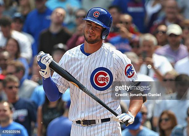 Kris Bryant of the Chicago Cubs reacts after striking out in his first Major League at-bat against the San Diego Padres at Wrigley Field on April 17,...