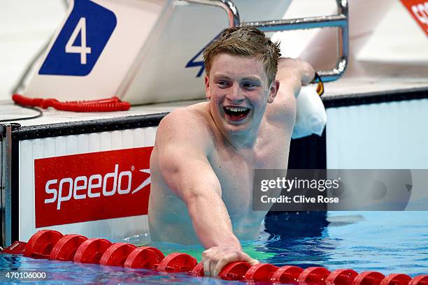 Adam Peaty of County of Derby celebrates wining the Men's 100m Breaststroke Final and breaking the World Record on day four of the British Swimming...