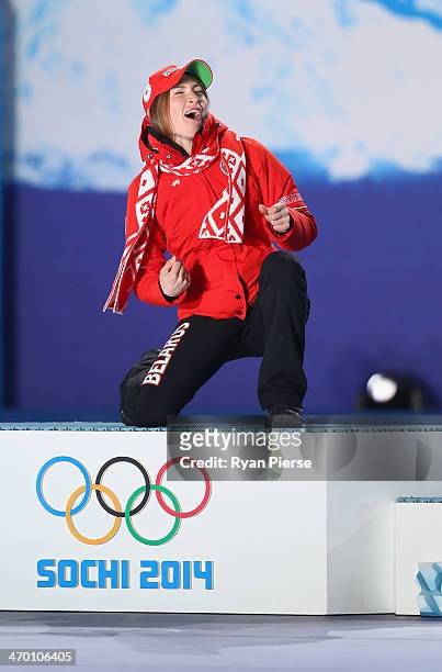 Gold medalist Darya Domracheva of Belarus celebrates on the podium during the medal ceremony for the Women's 12.5 km Mass Start on day 11 of the...