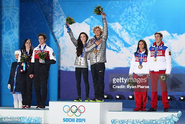 Silver medalists Tessa Virtue and Scott Moir of Canada, gold medalists Meryl Davis and Charlie White of the United States, and bronze medalists Elena...