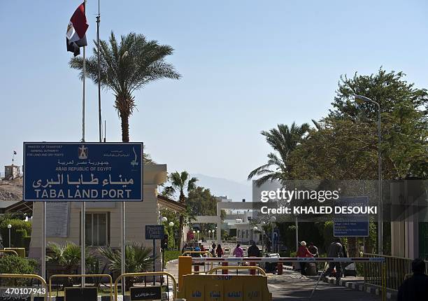 Tourists depart Egypt via the Taba Land Port crossing on February 18 two days after a tourist bus exploded in the Egyptian south Sinai resort town...