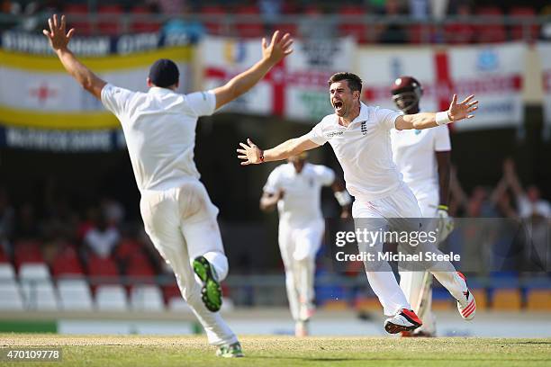 James Anderson of England claims the wicket of Denesh Ramdin of West Indies to pass Ian Botham's record of 383 Test wickets and become England's...