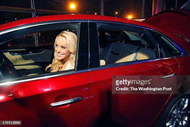 Britt McHenry, ABC7 weekend sports anchor, has fun in the candy apple Cadillac XTS 2013 ; there were also candy apple drinks and a candy bar, not to...