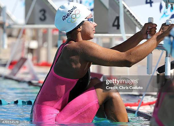 Carolina Colorado competes in the 100m Backstroke Prelims during day three of the Arena Pro Swim Series at the Skyline Acquatic Center on April 17,...