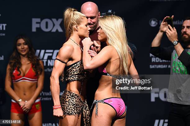 Felice Herrig and Paige VanZant face off during the UFC Fight Night weigh-in event at the Prudential Center on April 17, 2015 in Newark, New Jersey.