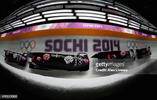 Paula Walker and Rebekah Wilson of Great Britain team 1 make a run during the Women's Bobsleigh heats on day 11 of the Sochi 2014 Winter Olympics at...