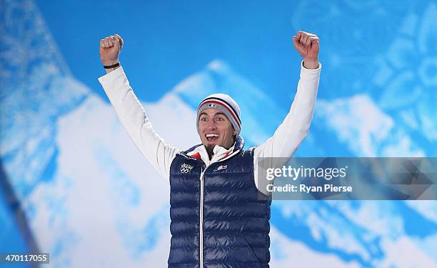 Gold medalist Pierre Vaultier of France celebrates during the medal ceremony for the Men's Snowboard Cross on day 11 of the Sochi 2014 Winter...