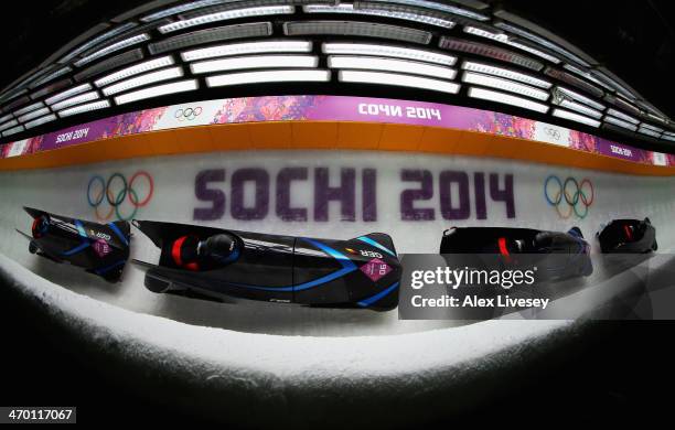 Anja Schneiderheinze and Stephanie Schneider of Germany team 3 make a run during the Women's Bobsleigh heats on day 11 of the Sochi 2014 Winter...