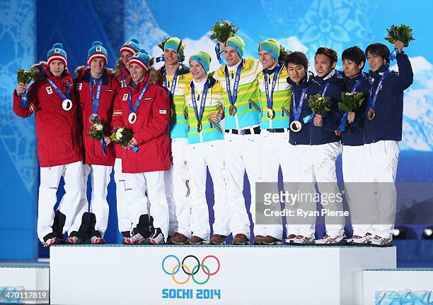 Silver medalists Michael Hayboeck, Thomas Morgenstern, Thomas Diethart and Gregor Schlierenzauer of Austria, gold medalists Wank, Marinus Kraus,...