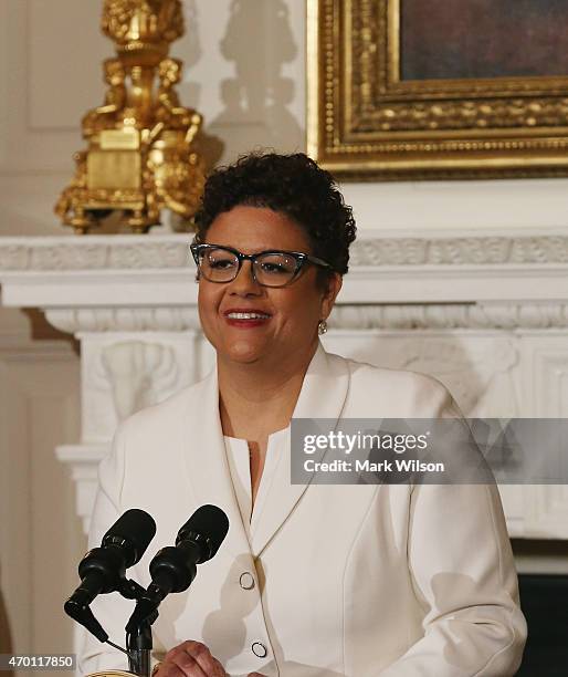 American poet Elizabeth Alexander speaks during an event in the State Dining Room at the White House April 17, 2015 in Washington, DC. First lady...