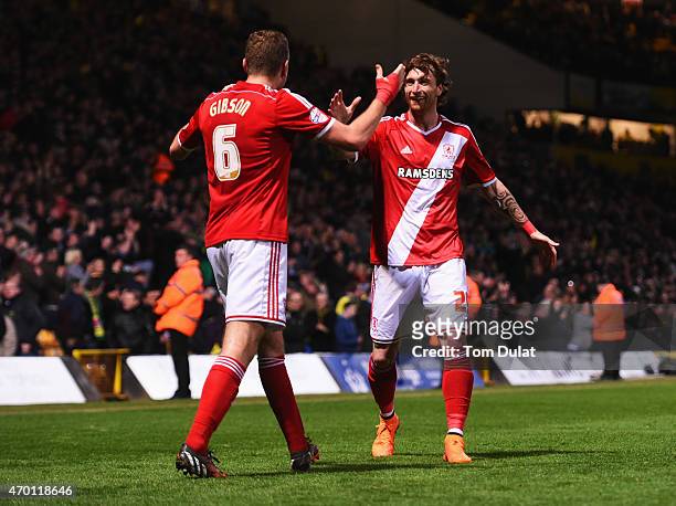 Ben Gibson and Fernando Amorebieta of Middlesbrough celebrate victory after the Sky Bet Championship match between Norwich City and Middlesbrough at...