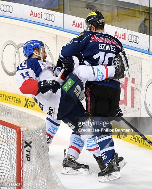Andrew Joudrey of the Adler Mannheim and Jeffrey Szwez of ERC Ingolstadt during the game between ERC Ingolstadt and Adler Mannheim on april 17, 2015...