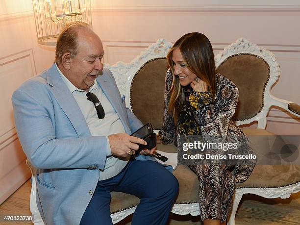 Sarah Jessica Parker poses with guests during the launch of SJP Pop-Up with Zappos Couture in The Shops at Crystals at Aria Las Vegas on April 16,...