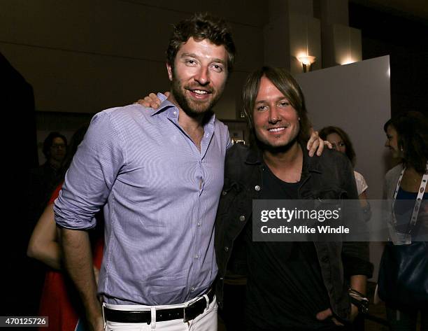 Singers Brett Eldredge and Keith Urban attend the Red Carpet Radio presented by Westwood One Radio during the 50th Academy Of Country Music Awards at...